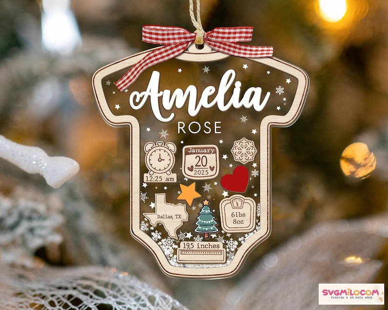 May include: A clear acrylic baby onesie-shaped ornament with a red and white gingham ribbon. It features the name Amelia Rose, a clock showing 12:25 am, a calendar date of January 20, 2025, a Texas map, a scale reading 61 lbs 8 oz, and 19.5 inches.