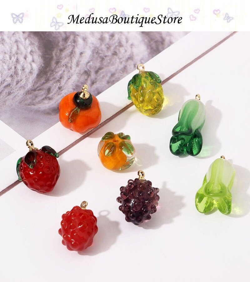 Set of Seven Handmade Glass Fruit Beads Including a Pear and a Strawberry  and a Lemon and a Lime and a Peach — The Glass Studio
