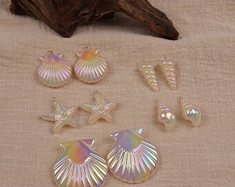 May include: Assortment of iridescent seashell and starfish charms with gold jump rings. The charms are perfect for jewelry making or crafting.