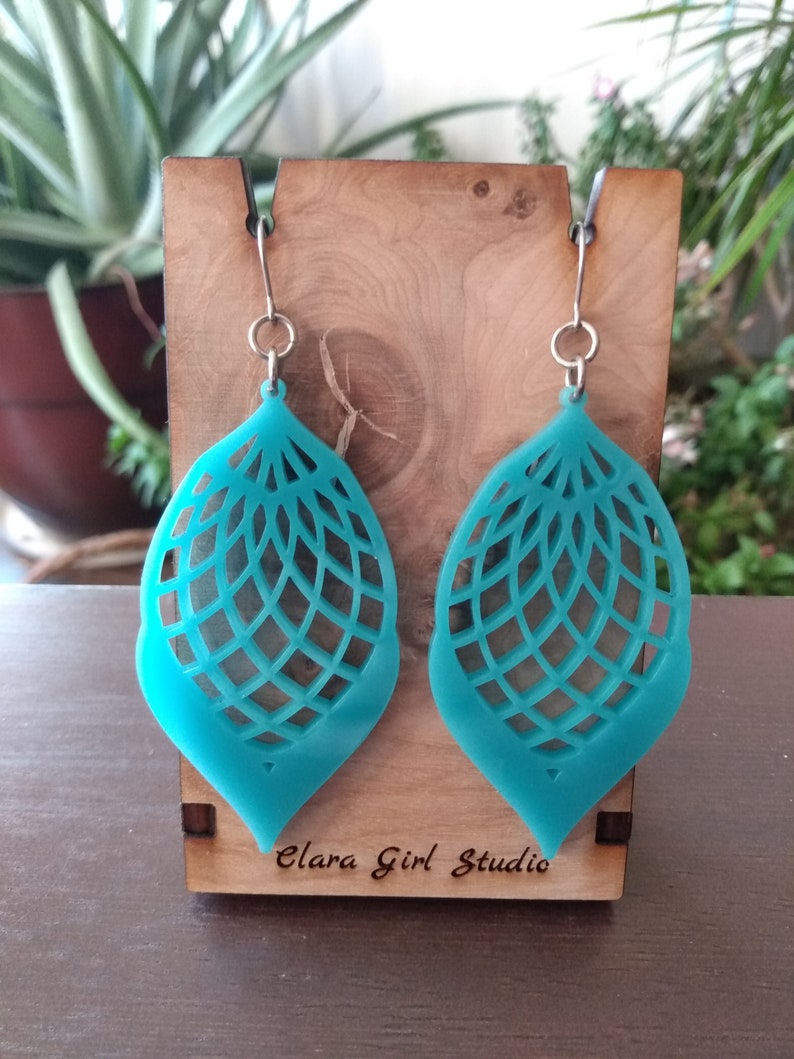 Turquoise laser cut acrylic dangle earrings
