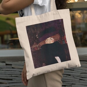 Gustav Klimt's Dame mit Hut und Federboa (1909) bolso de lona estética, bolso artístico, bolso lindo de todos los días, idea de regalo artístico, objetos de arte