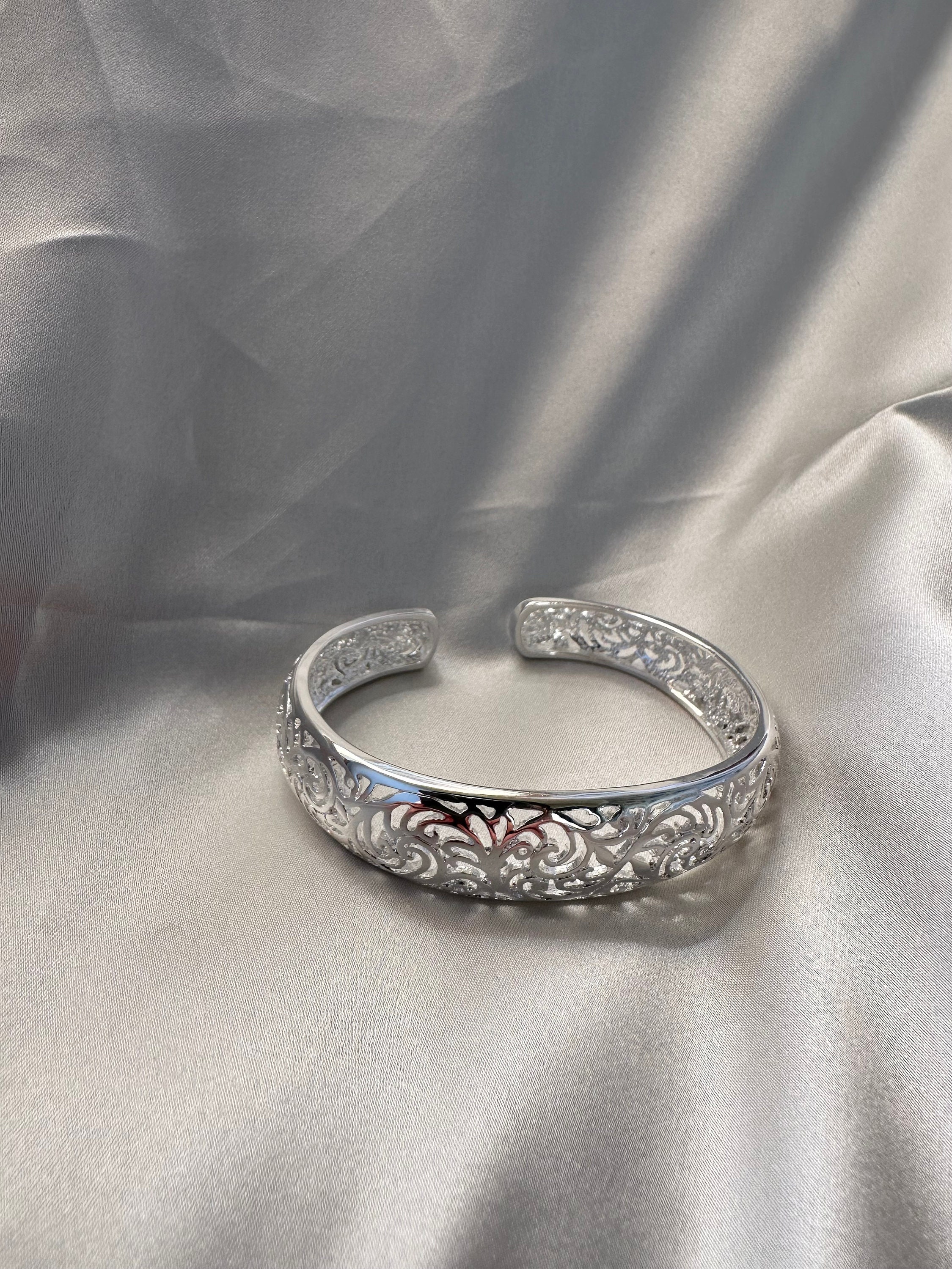 Adjustable silver best sale bangle