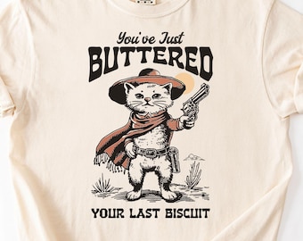 Você acabou de passar manteiga no seu último biscoito, camiseta engraçada com estampa de gato em cores confortáveis, camiseta sarcástica, camiseta com o parceiro Meowdy, ideia engraçada para presente de meme