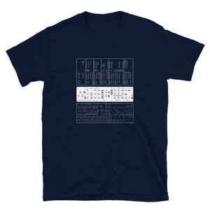 May include: A navy blue t-shirt with a white graphic of a synthesizer panel. The panel features the text "TR-808" and a series of knobs, buttons, and switches.