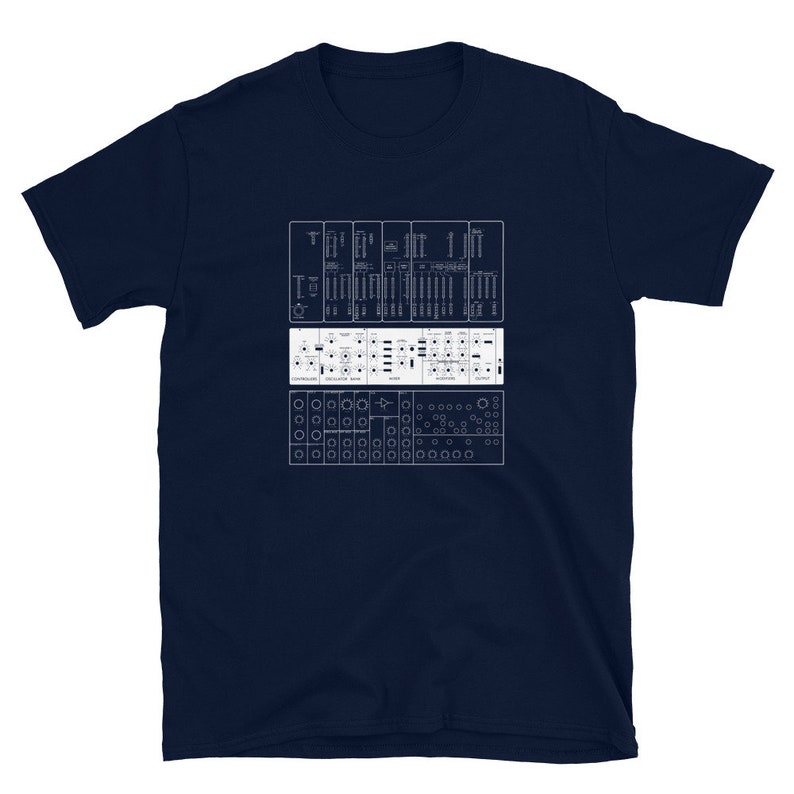 May include: A navy blue t-shirt with a white graphic of a synthesizer panel. The panel features the text "TR-808" and a series of knobs, buttons, and switches.