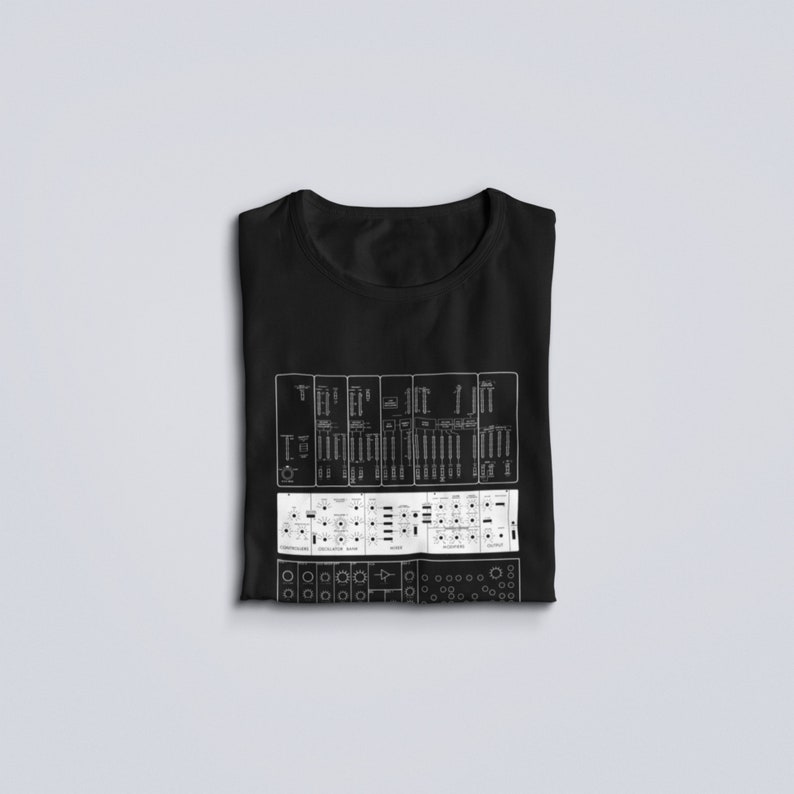 May include: Black t-shirt with a white graphic of a synthesizer control panel. The graphic includes the text "T-O-G".