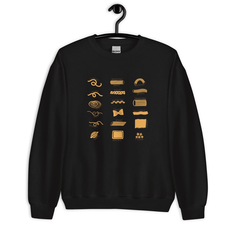 Peut inclure: Sweat-shirt noir avec un graphique de diff&eacute;rents types de p&acirc;tes avec leurs noms en jaune.