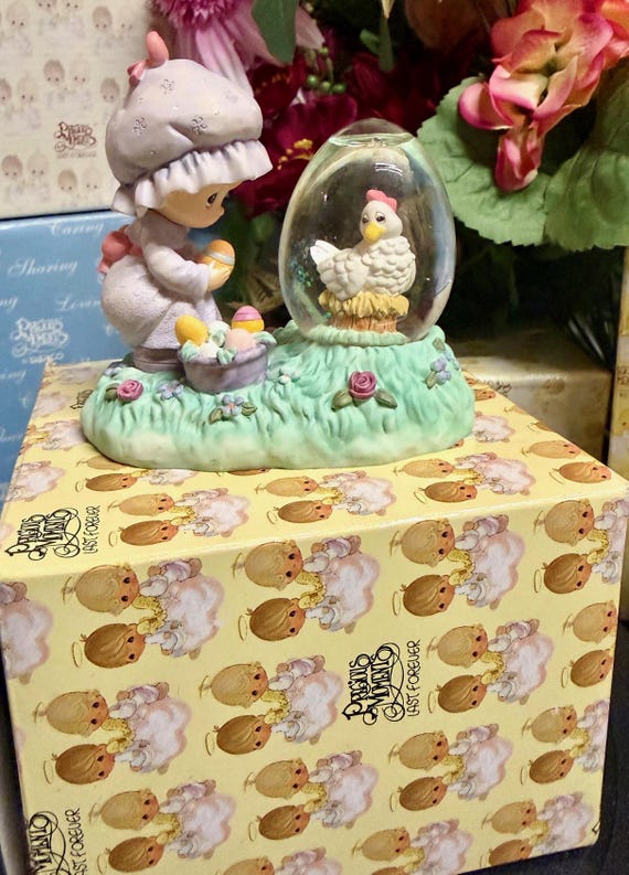 Precious Moments “Girl with Hen – Egg‑Shaped Waterball” (#960225, 1997)