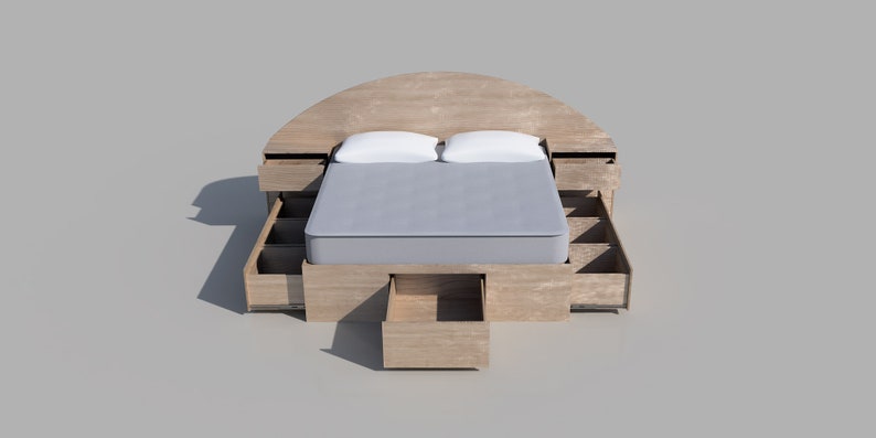 May include: A wooden bed frame with a curved headboard and multiple drawers. The bed is made up with white pillows and a light gray comforter.