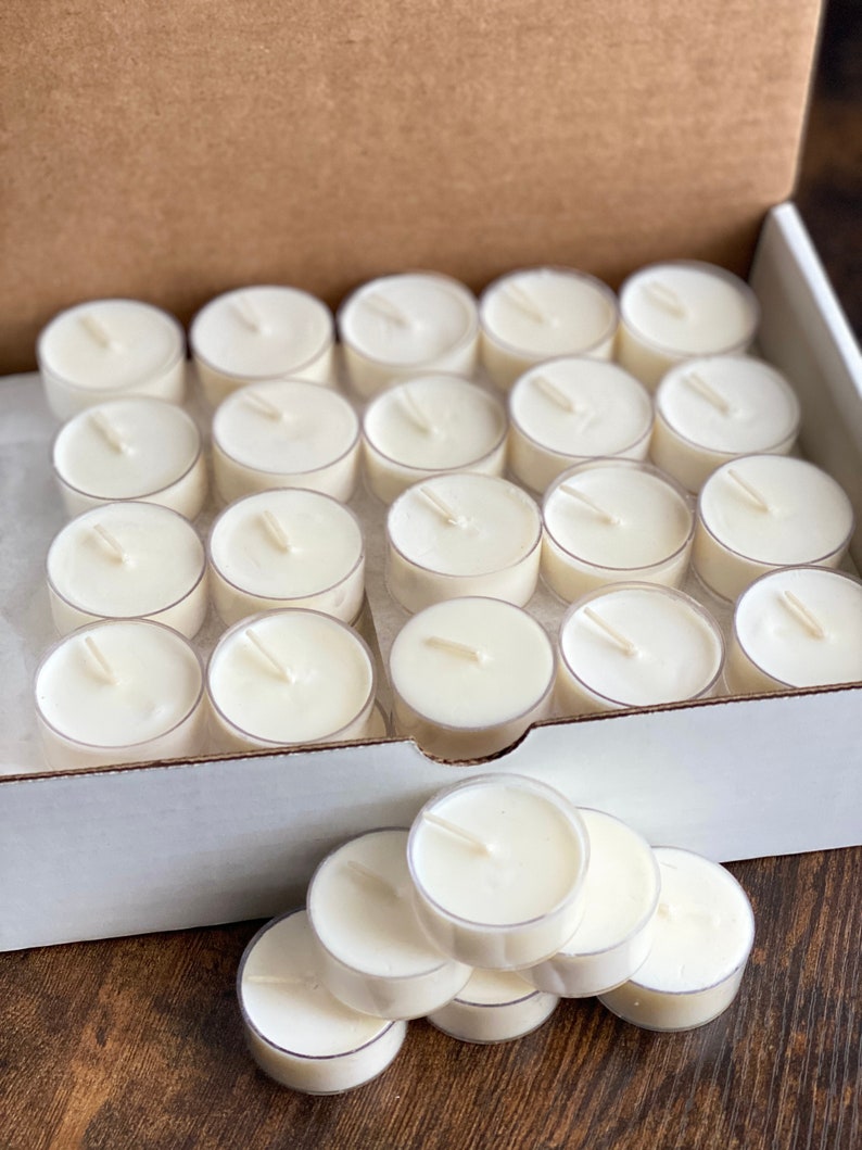 Wholesale tea lights in clear plastic cups, unscented and scented, can be used with tea light wax melt warmers. Great for decorating for weddings, receptions, and other special events.