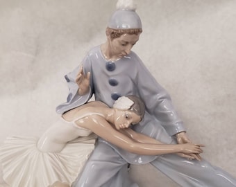 Four Lladro porcelain figure groups, comprising Closing Scene, No. 4935,  Once Upon A Time, No. 5721