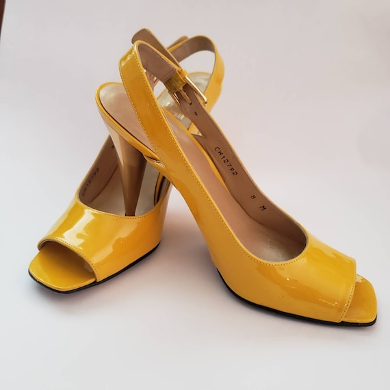Yellow 'Viva' slingback shoes Salvatore Ferragamo - Picnics in Pastels With  These Jackie O-Inspired Sandals - IetpShops GB