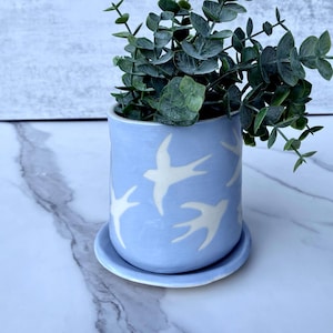 Ceramic planter, sparrow design, blue gray color, illustration, pottery, slab clay, plant hanging, porcelain, inside, outside planter, bird