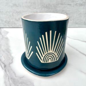Ceramic planter, sunset design, teal color, illustration, pottery, slab clay, plant hanging, porcelain, inside, outside planter, sun ray
