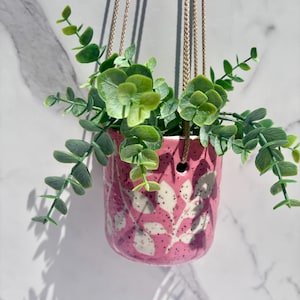 Ceramic planter, flower design, floral,  pink color, illustration, pottery, slab clay, plant hanging, porcelain, inside, outside planter