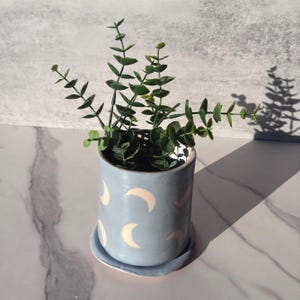 Ceramic planter, moon design, blue gray color, illustration, pottery, slab clay, plant hanging, porcelain, inside, outside planter