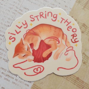 silly string theory cat sticker | theoretical physics sticker | stem sticker | silly meme sticker | cute cat sticker | orange brain cell cat