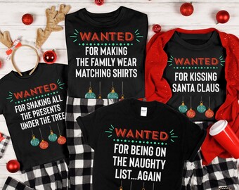 May include: Four black t-shirts with white text and red and green Christmas ornaments. The text on the shirts reads "WANTED" and includes a reason for being wanted, such as "For making the family wear matching shirts" or "For being on the naughty list...again".