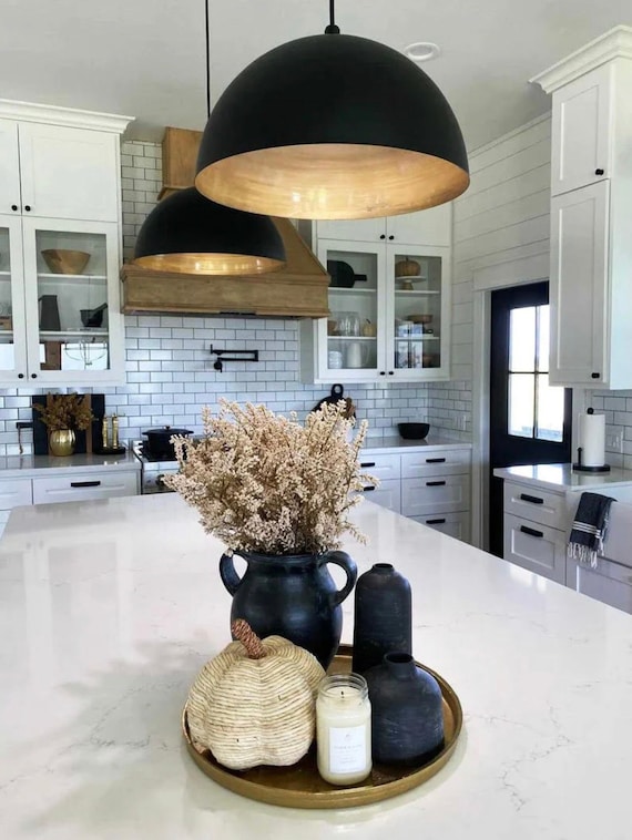 BRASS PENDANT LIGHTS IN THE KITCHEN