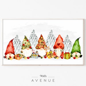 May include: Five gnomes with red, green, and brown hats stand in front of a snowy forest. They are holding presents and one gnome has a sign that says "Hello Christmas".