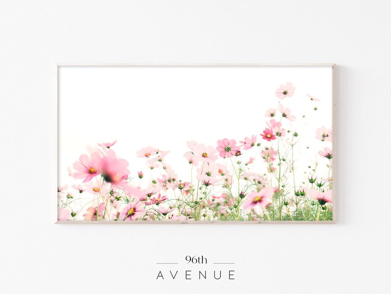 May include: A framed print of a field of pink cosmos flowers against a white background. The print has the text "96th AVENUE" at the bottom.