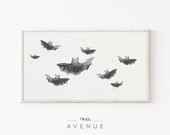May include: A framed print featuring a flock of stylized black and gray bats against a textured off-white background. The artwork has a minimalist aesthetic, perfect for Halloween or gothic decor. The text "96th AVENUE" is at the bottom.
