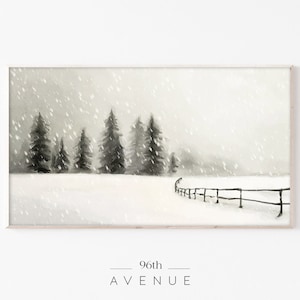 Könnte beinhalten: Ein Aquarellbild einer verschneiten Landschaft mit einem Holzzaun im Vordergrund. Die Bäume sind vor einem grauen Himmel mit fallendem Schnee silhouettiert. Das Bild ist in einem hellen Holzrahmen gerahmt.