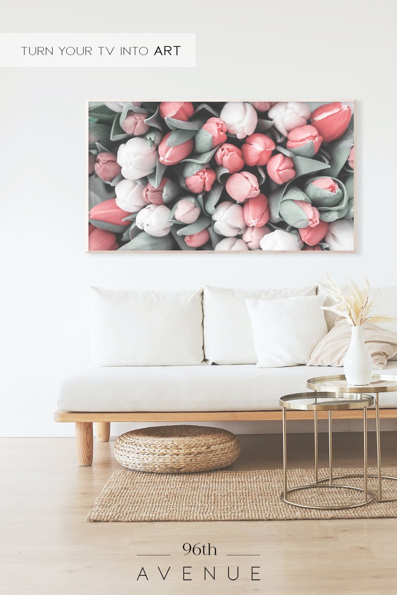 May include: A close-up image of a bunch of pink and white tulips. The tulips are arranged in a tight cluster, with the stems and leaves visible. The image is soft and romantic, with a vintage feel.