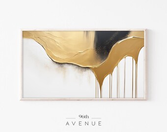 May include: Abstract painting with gold and black paint dripping down a white background. The painting is framed in a light wood frame. The text "96th AVENUE" is printed below the frame.