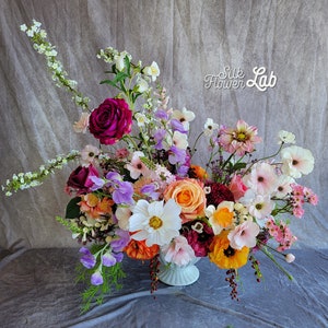 Artificial butterfly ranunculus arrangement in a white ceramic, with real touch rose, real touch dahlia,  sweet pea, Spiraea, Zinnea, cosmos