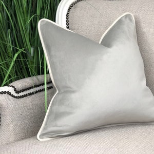 Silver/light grey tone plush velvet cushion cover with ivory white contrast piping, velvet throw pillow cover