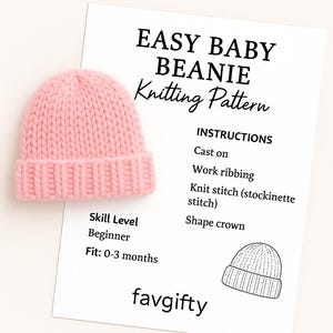 May include: A pink knitted baby beanie next to a white paper with the text "EASY BABY BEANIE Knitting Pattern". The pattern includes instructions for beginners and fits babies 0-3 months old.