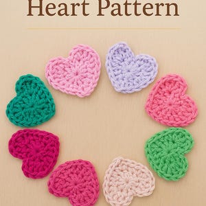 May include: A collection of eight crocheted heart shapes in various colors, including pink, green, and purple, arranged in a circular pattern. The text "Favgifty Heart Pattern" is displayed at the top of the image.