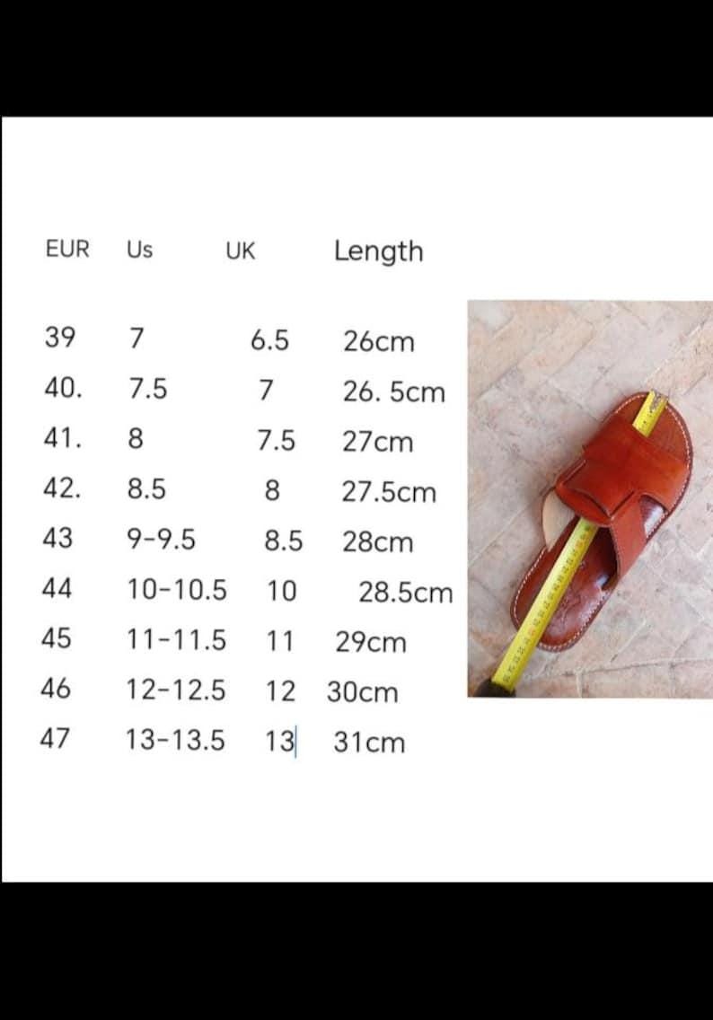May include: A brown leather sandal with a cross-strap design is measured with a yellow tape measure. The image also includes a size chart with EUR, US, and UK sizes, and lengths in centimeters, ranging from 26cm to 31cm.