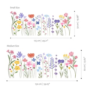 May include: Watercolor floral wall decals in small and medium sizes. The small size is 125 cm wide and 50 cm tall. The medium size is 150 cm wide and 60 cm tall. The decals feature colorful flowers.
