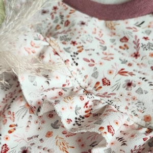 Baby and children&#39;s sweaters, flowers