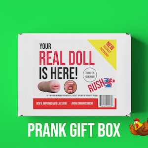 May include: A white box with the text "YOUR REAL DOLL IS HERE!" and a picture of a doll's head and body. The box also has the text "NEW DISCREET PACKAGING!" and "PRANK GIFT BOX". A cartoon rooster is in the lower right corner of the image.