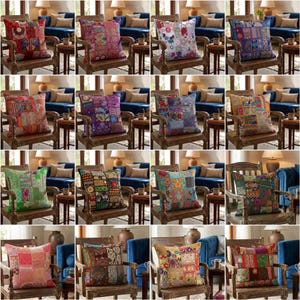 May include: A collection of sixteen square throw pillows, each featuring a unique patchwork design composed of various fabric squares with intricate patterns, embroidery, and vibrant colors, displayed on wooden chairs in a home setting.