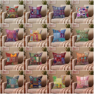 May include: A collection of sixteen square scatter cushions, each featuring a unique patchwork design composed of various colourful fabric squares with intricate patterns, embroidery, and decorative stitching in a wide array of vibrant colour palettes.