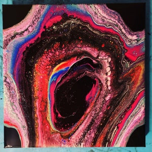 May include: Abstract painting with swirling pink, red, blue, and black colors. The painting features a large, dark, circular shape in the center.