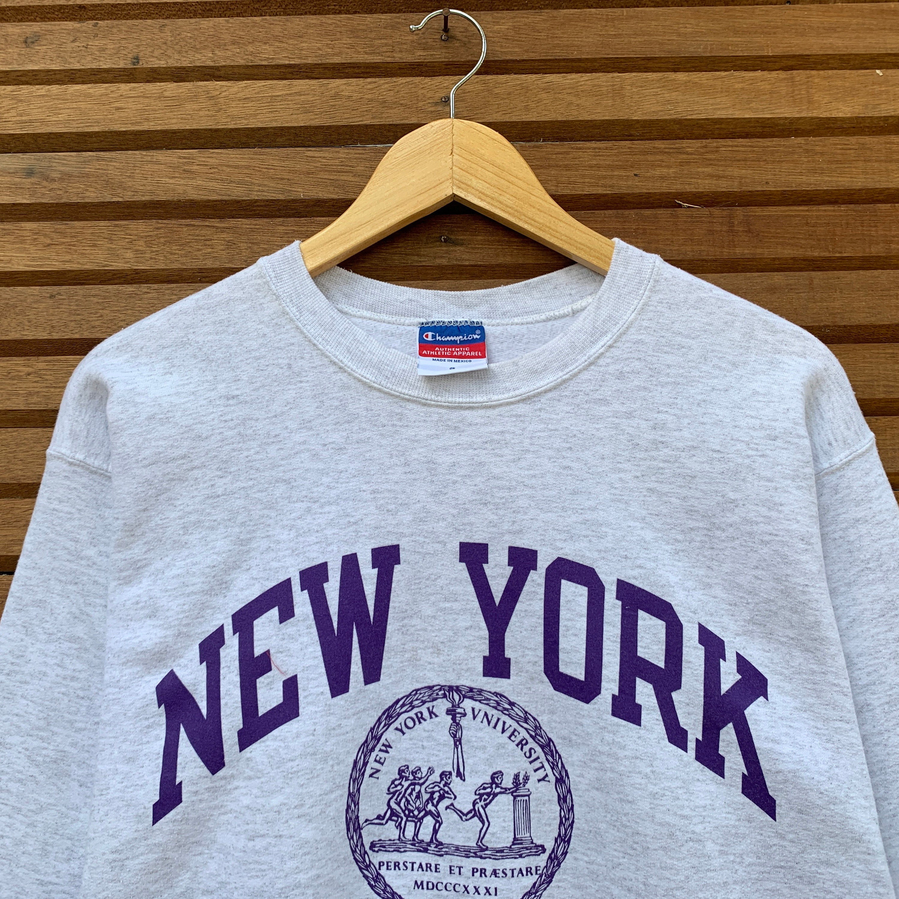 Champion sweater hot sale universal new york