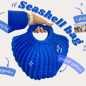 May include: A blue crochet seashell bag with a handle. The bag is made with a textured stitch and has a rounded shape. The image includes the text "Seashell bag" and "crochet pattern".