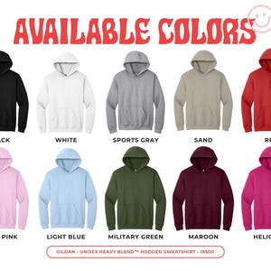 May include: A display of unisex hooded sweatshirts in various colors, including black, white, gray, sand, red, light pink, light blue, military green, maroon, and heliconia. The text "AVAILABLE COLORS" is at the top.