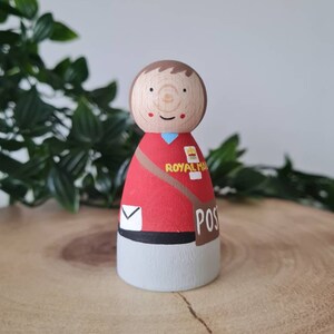 postman peg doll