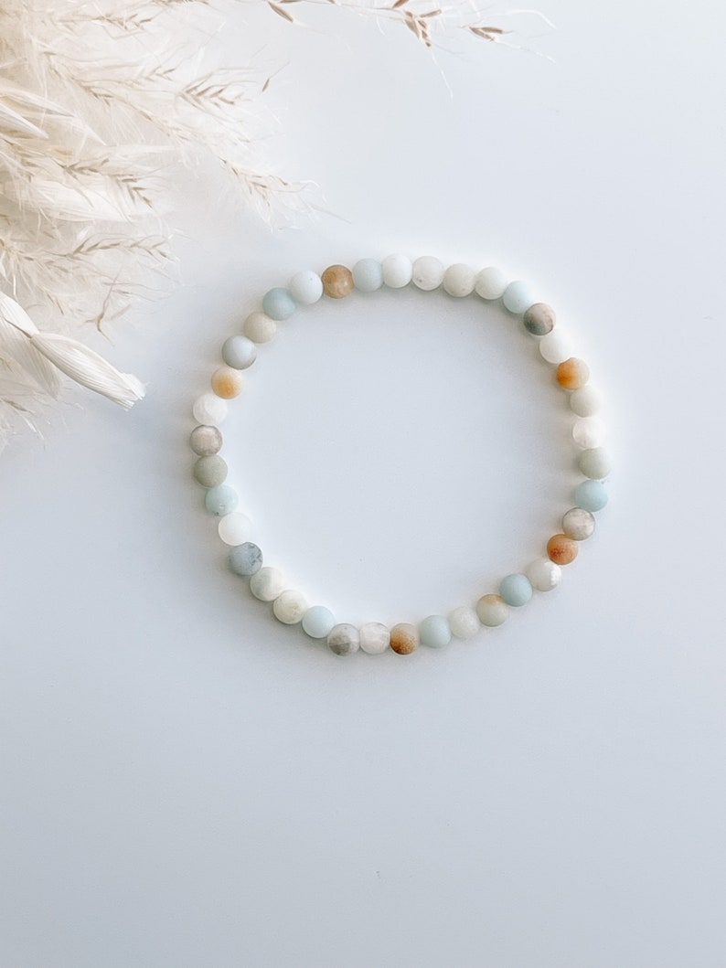 Set di braccialetti magnetici per coppie - Howlite bianca e onice nero - Italia