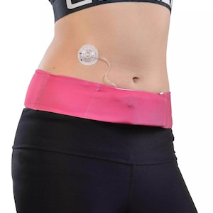 Insulin pump belt for Medtronic Minimed, Tandem t:slim X2, Ypsopump, Dana RS, Accu Check Combo, and many more. Dia-Bellyband Fuchsia Flash