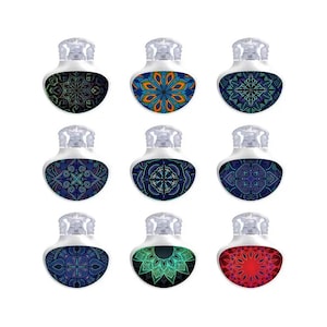 May include: Nine decorative bottle stoppers with clear tops and patterned bases. The bases feature intricate mandala designs in various colours, including green, blue, orange, and red. The stoppers are arranged in a three-by-three grid against a white background.
