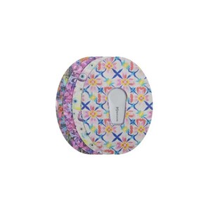 May include: A stack of decorative adhesive patches with floral and geometric patterns. The patches feature a variety of colors, including pink, blue, and white. The text "eascum G6" is visible on one of the patches.