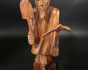 Vintage Smiling Dwarf Miner Man Japan Ceramic Boy Pushing Orange