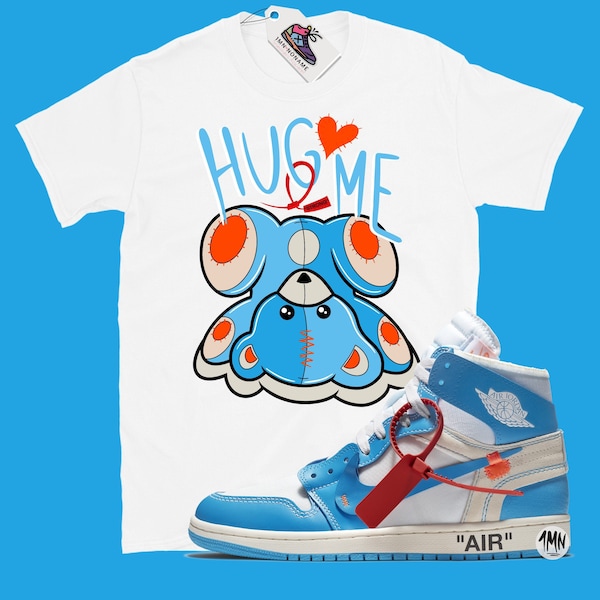 HUG ME STRONG Jordan Air Jordan 1 High gebroken wit universiteitsblauw shirt, Jordan gebroken wit wedstrijdshirt